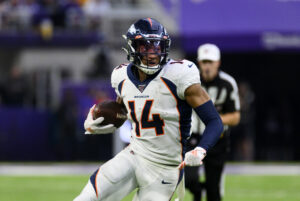 Courtland Sutton #14 of the Denver Broncos runs with the ball the ball in the first quarter of the game against the Minnesota Vikings at U.S. Bank Stadium on November 17, 2019 in Minneapolis, Minnesota.