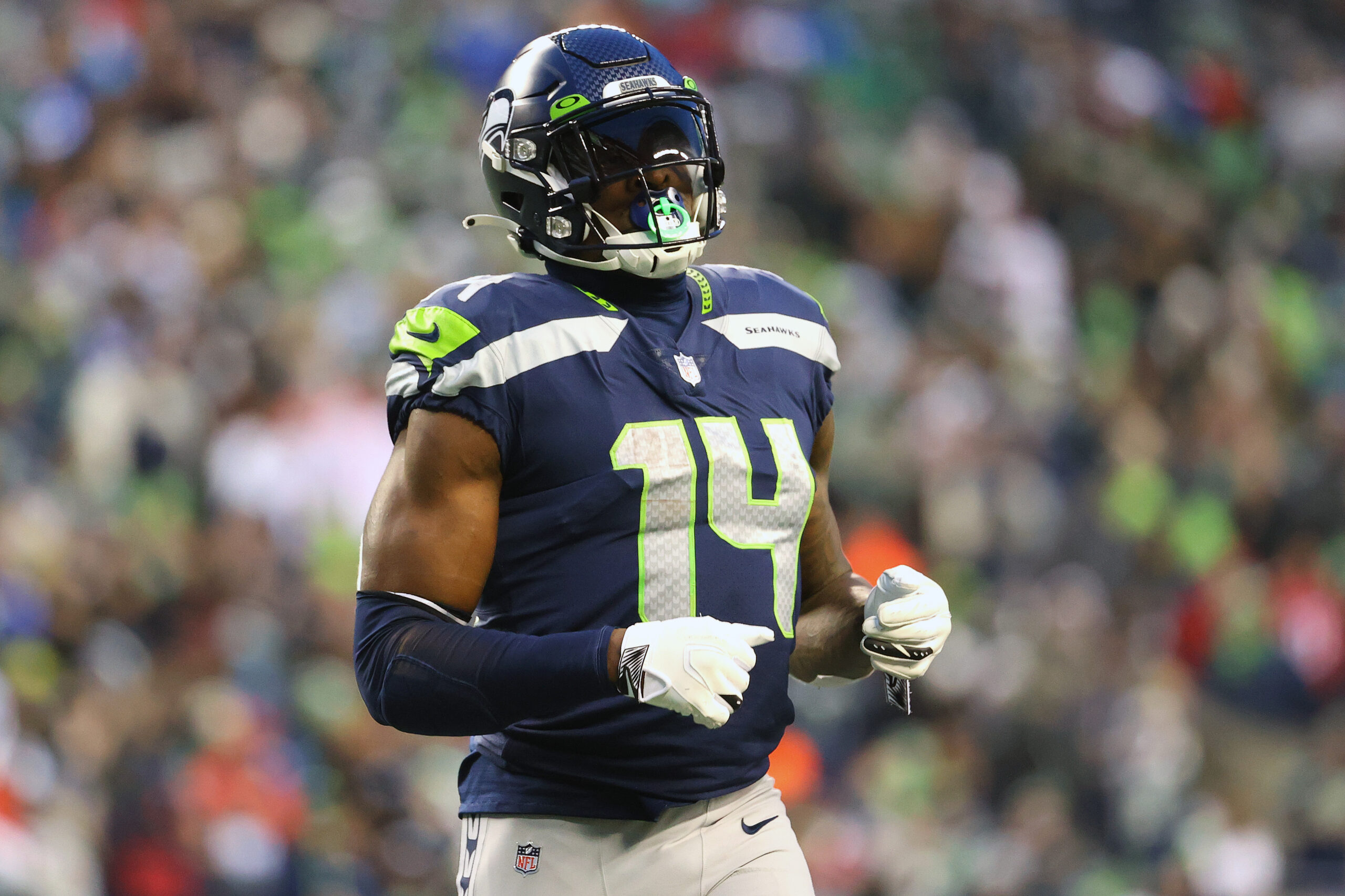 DK Metcalf #14 of the Seattle Seahawks looks on against the San Francisco 49ers during the fourth quarter at Lumen Field on December 05, 2021 in Seattle, Washington.
