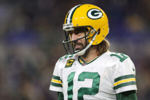 Aaron Rodgers #12 of the Green Bay Packers looks on during a time out in the fourth quarter against the Baltimore Ravens at M&T Bank Stadium on December 19, 2021 in Baltimore, Maryland.