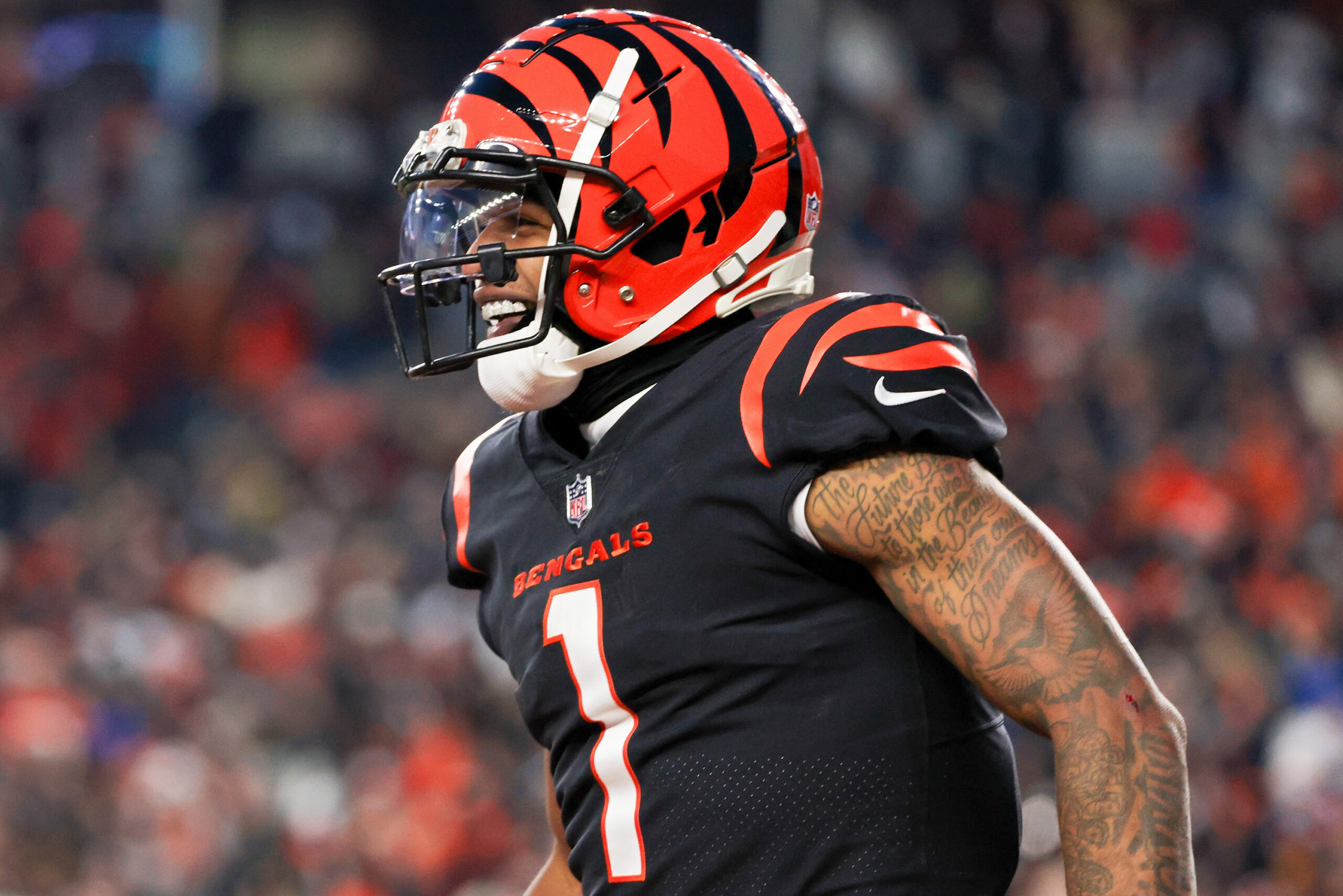 Ja'Marr Chase #1 of the Cincinnati Bengals celebrates in the second quarter against the Las Vegas Raiders during the AFC Wild Card playoff game at Paul Brown Stadium on January 15, 2022 in Cincinnati, Ohio.